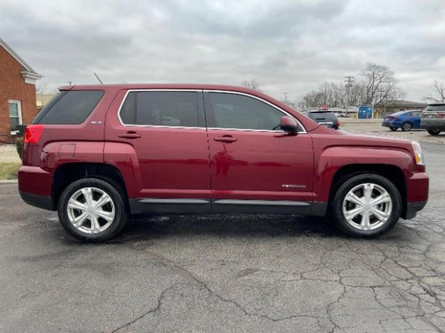 2017 Crimson Red Tintcoat GMC Terrain SLE2 AWD (2GKFLSEKXH6) with an 2.4L L4 DOHC 16V engine, 6-Speed Automatic transmission, located at 1184 Kauffman Ave, Fairborn, OH, 45324, (937) 908-9800, 39.807365, -84.029114 - Photo#1