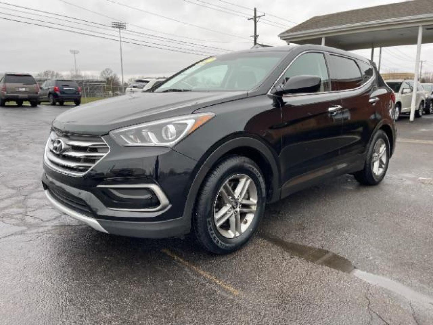 2017 Twilight Black Hyundai Santa Fe Sport 2.4 FWD (5XYZT3LBXHG) with an 2.4L L4 DOHC 16V engine, 6-Speed Automatic transmission, located at 1230 East Main St, Xenia, OH, 45385, (937) 908-9800, 39.687321, -83.910294 - Photo#1