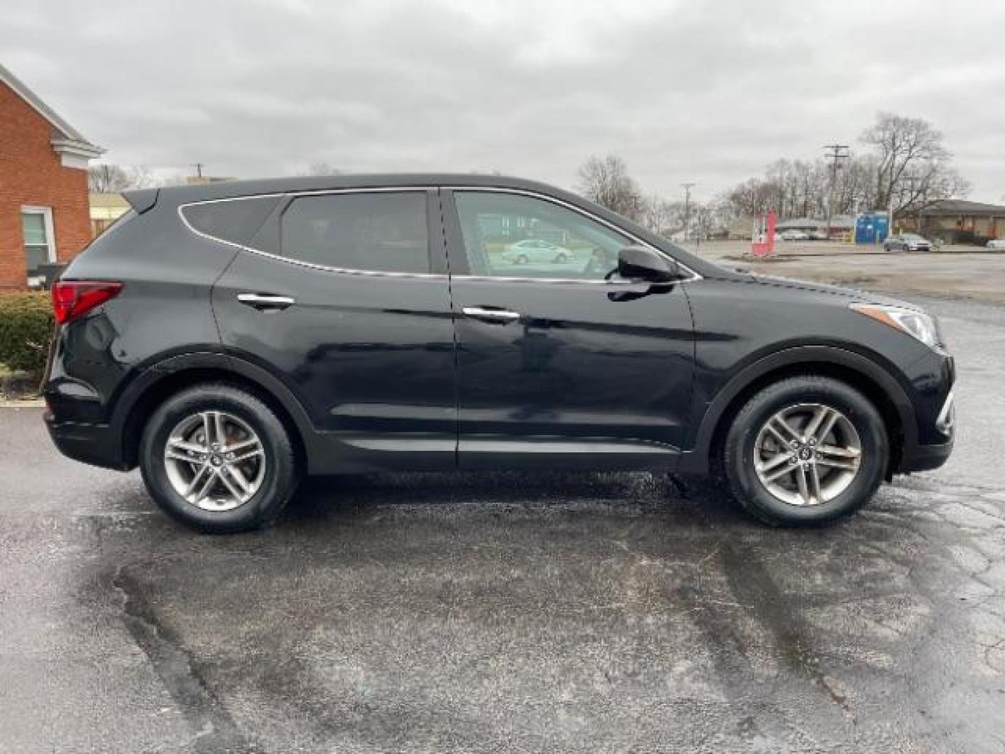 2017 Twilight Black Hyundai Santa Fe Sport 2.4 FWD (5XYZT3LBXHG) with an 2.4L L4 DOHC 16V engine, 6-Speed Automatic transmission, located at 1230 East Main St, Xenia, OH, 45385, (937) 908-9800, 39.687321, -83.910294 - Photo#3