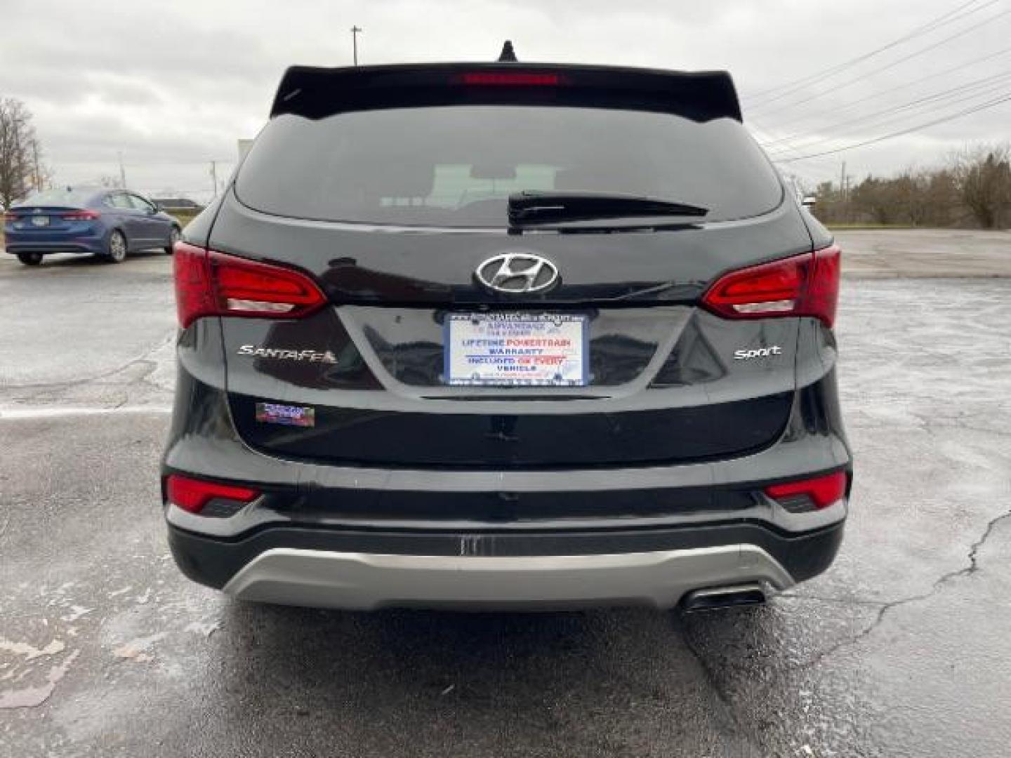 2017 Twilight Black Hyundai Santa Fe Sport 2.4 FWD (5XYZT3LBXHG) with an 2.4L L4 DOHC 16V engine, 6-Speed Automatic transmission, located at 1230 East Main St, Xenia, OH, 45385, (937) 908-9800, 39.687321, -83.910294 - Photo#4