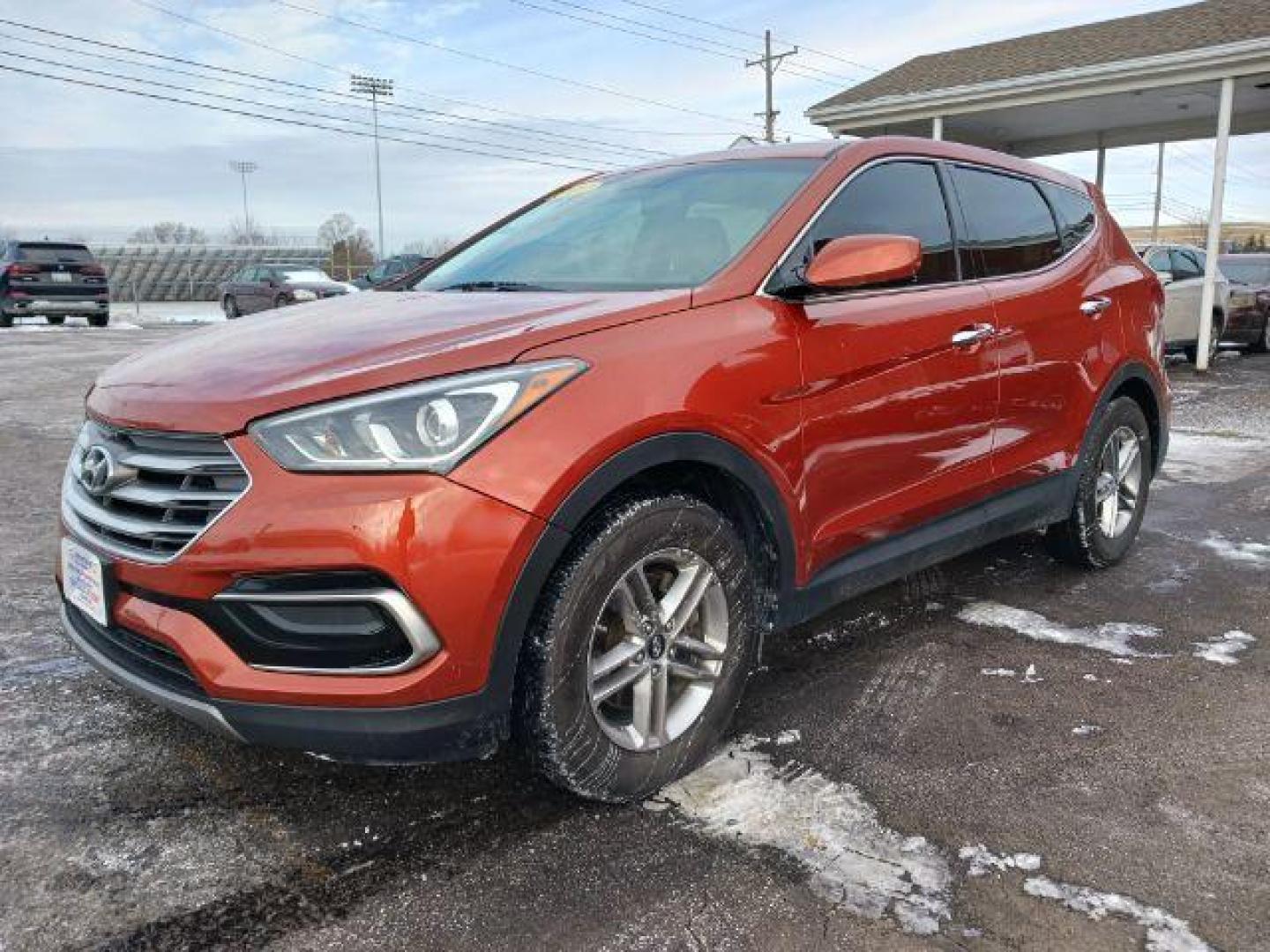 2017 Canyon Copper Hyundai Santa Fe Sport 2.4 AWD (5XYZTDLB2HG) with an 2.4L L4 DOHC 16V engine, 6-Speed Automatic transmission, located at 1951 S Dayton Lakeview Rd., New Carlisle, OH, 45344, (937) 908-9800, 39.890999, -84.050255 - Photo#2