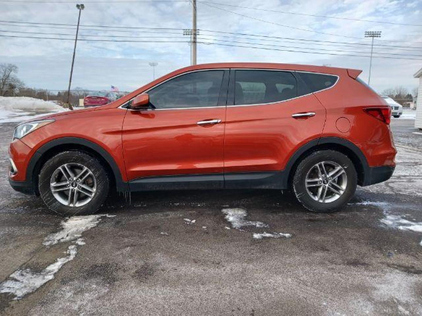 2017 Canyon Copper Hyundai Santa Fe Sport 2.4 AWD (5XYZTDLB2HG) with an 2.4L L4 DOHC 16V engine, 6-Speed Automatic transmission, located at 1951 S Dayton Lakeview Rd., New Carlisle, OH, 45344, (937) 908-9800, 39.890999, -84.050255 - Photo#3