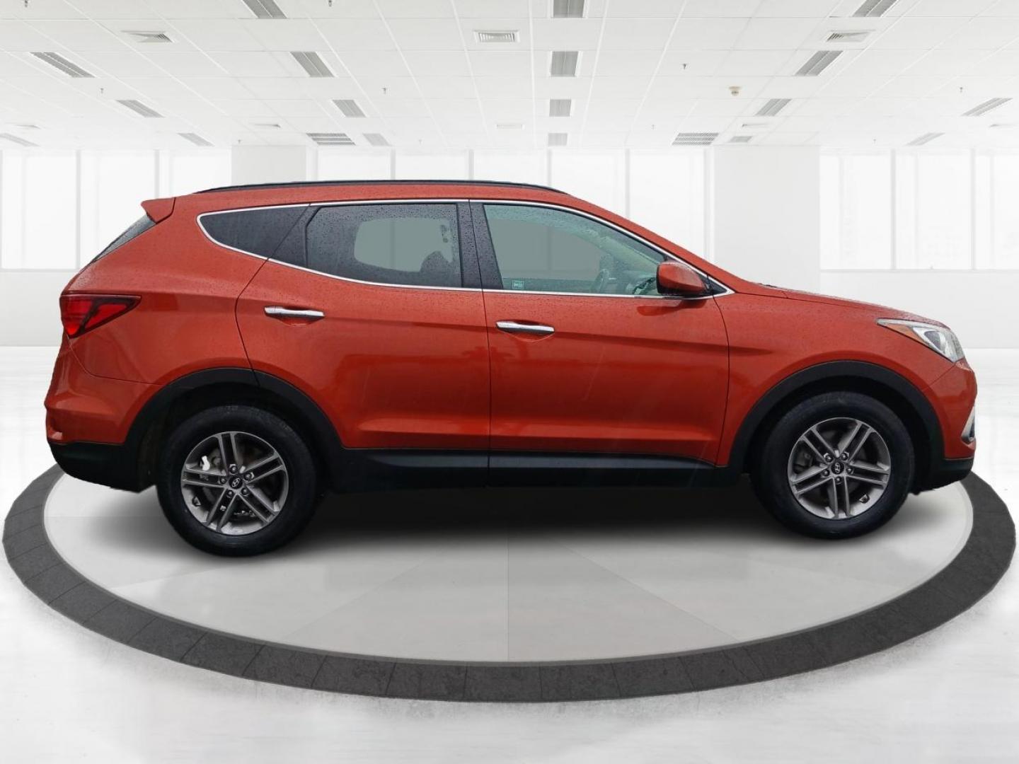 2017 Canyon Copper Hyundai Santa Fe Sport 2.4 AWD (5XYZUDLB3HG) with an 2.4L L4 DOHC 16V engine, 6-Speed Automatic transmission, located at 401 Woodman Dr, Riverside, OH, 45431, (937) 908-9800, 39.763779, -84.122063 - Photo#1