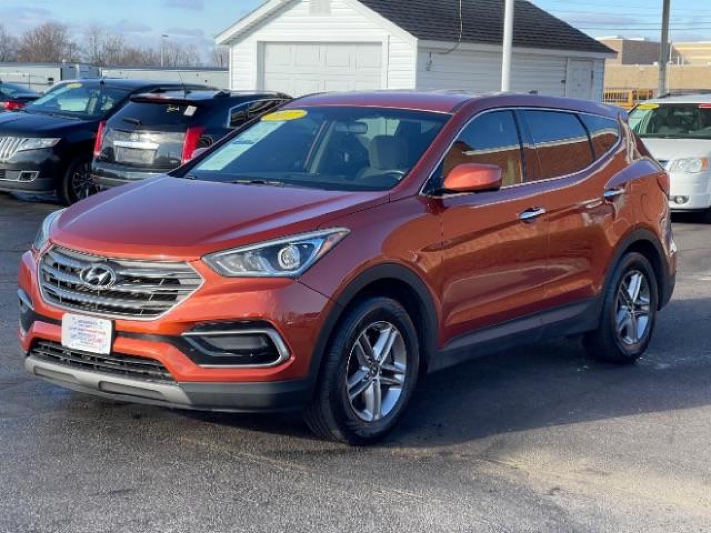 2017 Canyon Copper Hyundai Santa Fe Sport 2.4 FWD (5XYZT3LB8HG) with an 2.4L L4 DOHC 16V engine, 6-Speed Automatic transmission, located at 1230 East Main St, Xenia, OH, 45385, (937) 908-9800, 39.687321, -83.910294 - Photo#1