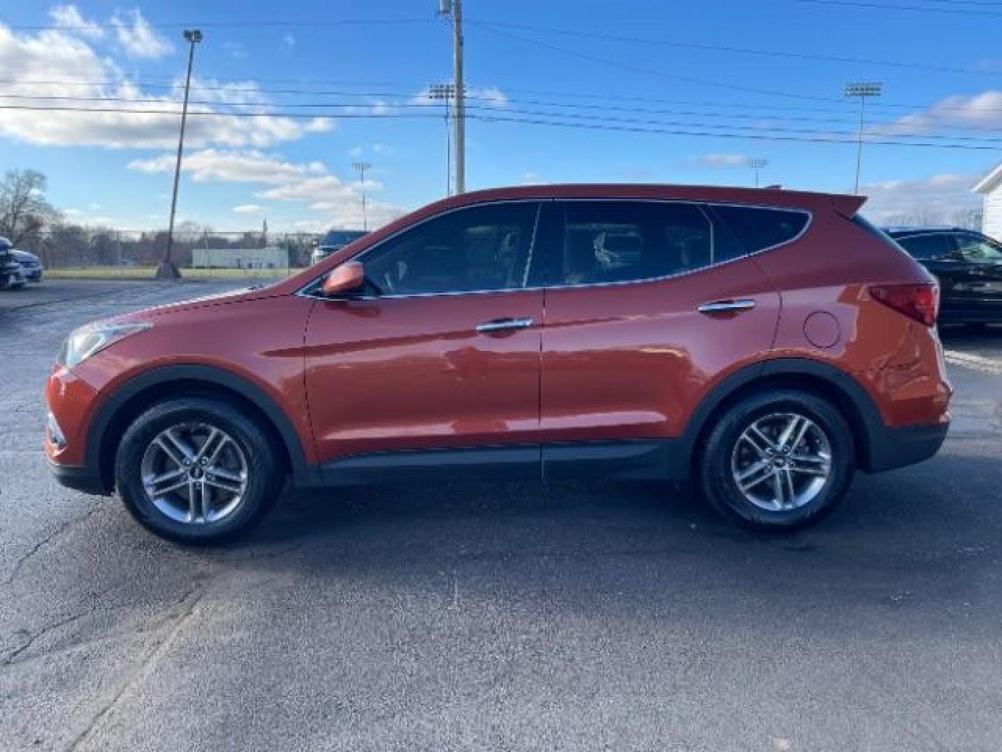 2017 Canyon Copper Hyundai Santa Fe Sport 2.4 FWD (5XYZT3LB8HG) with an 2.4L L4 DOHC 16V engine, 6-Speed Automatic transmission, located at 1230 East Main St, Xenia, OH, 45385, (937) 908-9800, 39.687321, -83.910294 - Photo#2