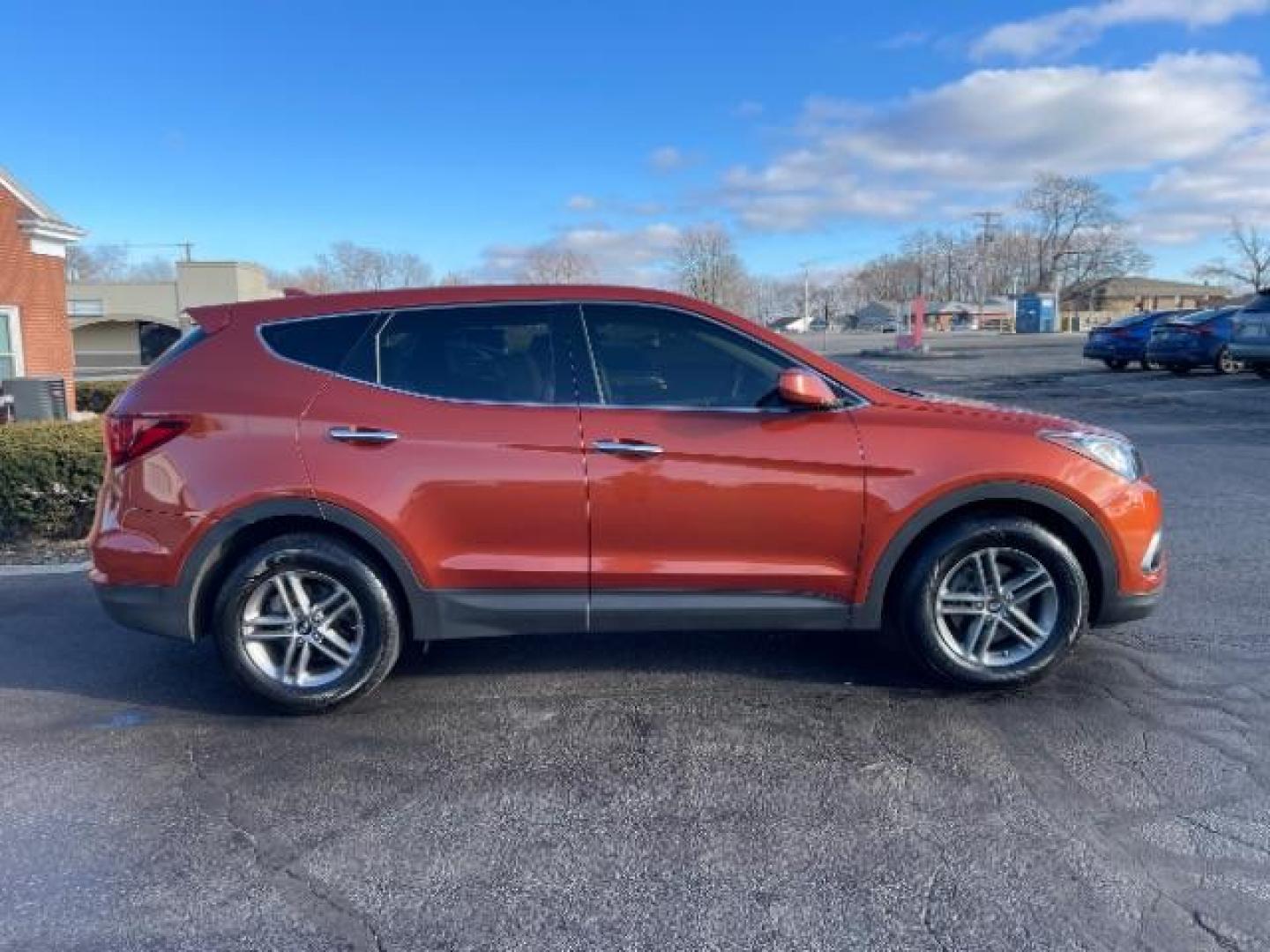 2017 Canyon Copper Hyundai Santa Fe Sport 2.4 FWD (5XYZT3LB8HG) with an 2.4L L4 DOHC 16V engine, 6-Speed Automatic transmission, located at 1230 East Main St, Xenia, OH, 45385, (937) 908-9800, 39.687321, -83.910294 - Photo#3