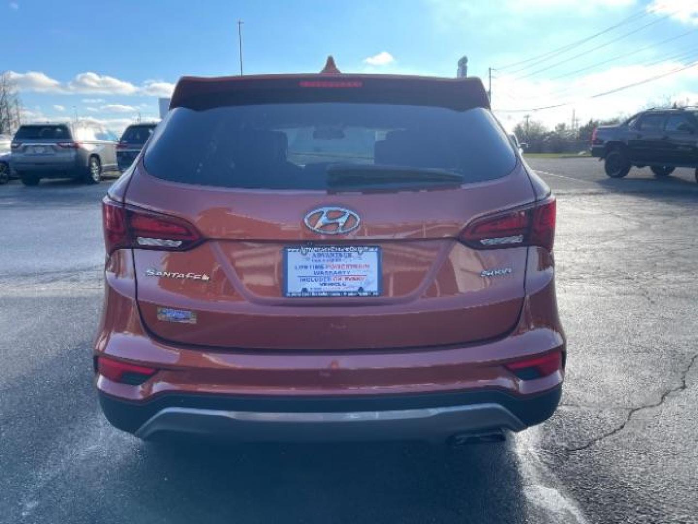 2017 Canyon Copper Hyundai Santa Fe Sport 2.4 FWD (5XYZT3LB8HG) with an 2.4L L4 DOHC 16V engine, 6-Speed Automatic transmission, located at 1230 East Main St, Xenia, OH, 45385, (937) 908-9800, 39.687321, -83.910294 - Photo#4