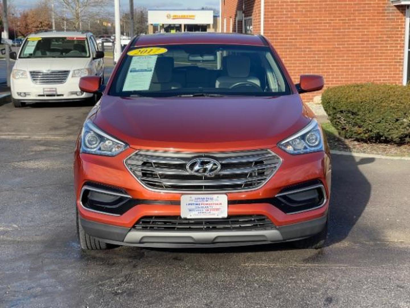 2017 Canyon Copper Hyundai Santa Fe Sport 2.4 FWD (5XYZT3LB8HG) with an 2.4L L4 DOHC 16V engine, 6-Speed Automatic transmission, located at 1230 East Main St, Xenia, OH, 45385, (937) 908-9800, 39.687321, -83.910294 - Photo#5