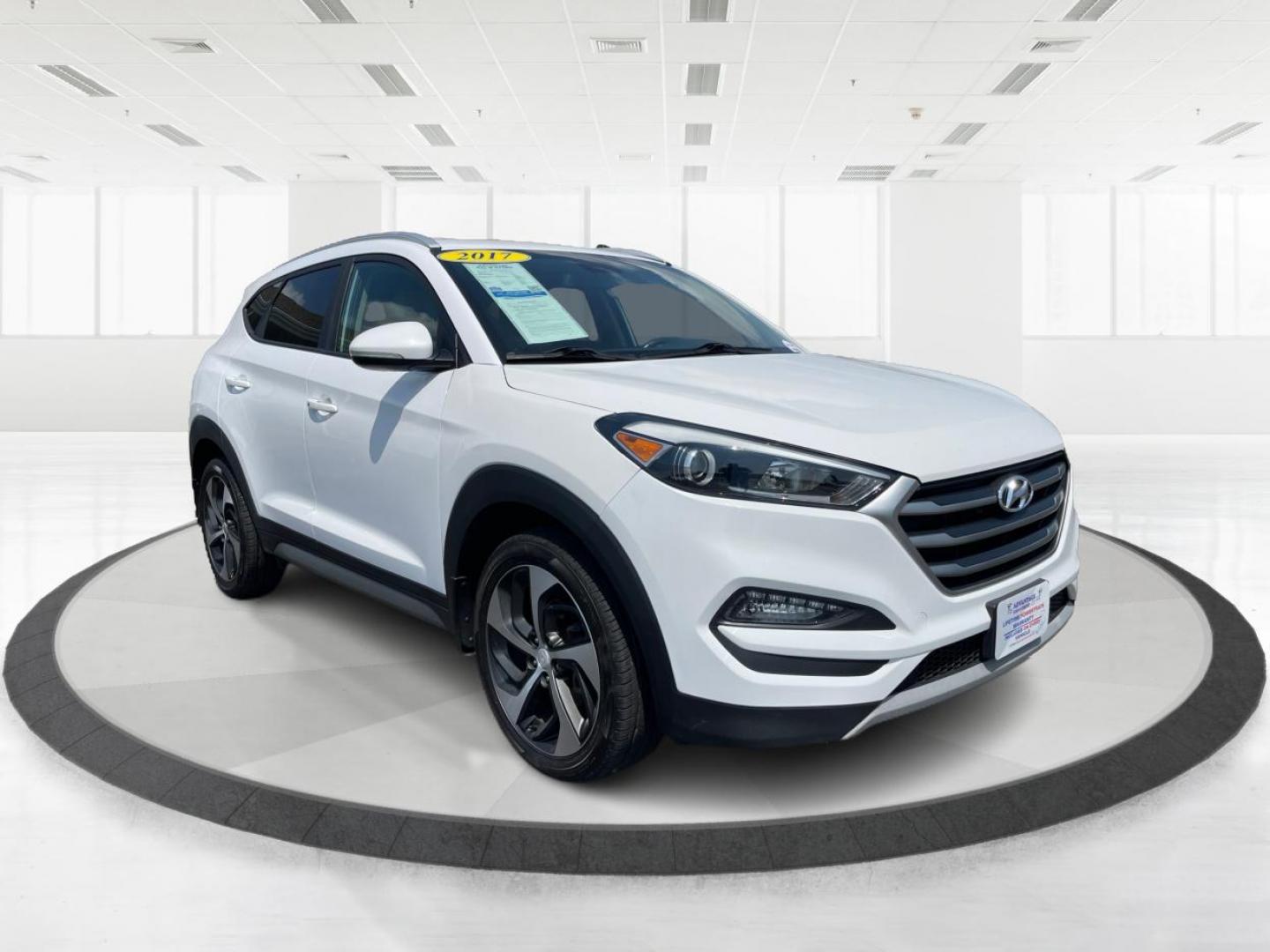 2017 Dazzling White Hyundai Tucson (KM8J3CA22HU) with an 1.6L L4 DOHC 16V engine, 7-Speed Automatic transmission, located at 1184 Kauffman Ave, Fairborn, OH, 45324, (937) 908-9800, 39.807365, -84.029114 - Photo#0