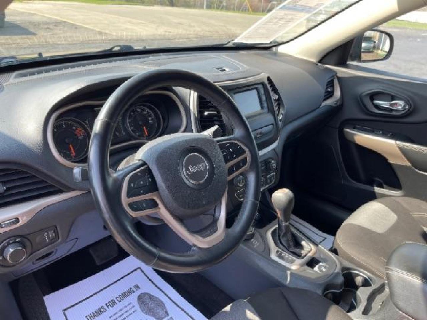 2017 DB Black Pearl Coat Jeep Cherokee Sport 4WD (1C4PJMAB8HW) with an 2.4L L4 DOHC 16V engine, 9-Speed Automatic transmission, located at 1099 N County Rd 25A, OH, 45373, (937) 908-9800, 40.057079, -84.212883 - Photo#6