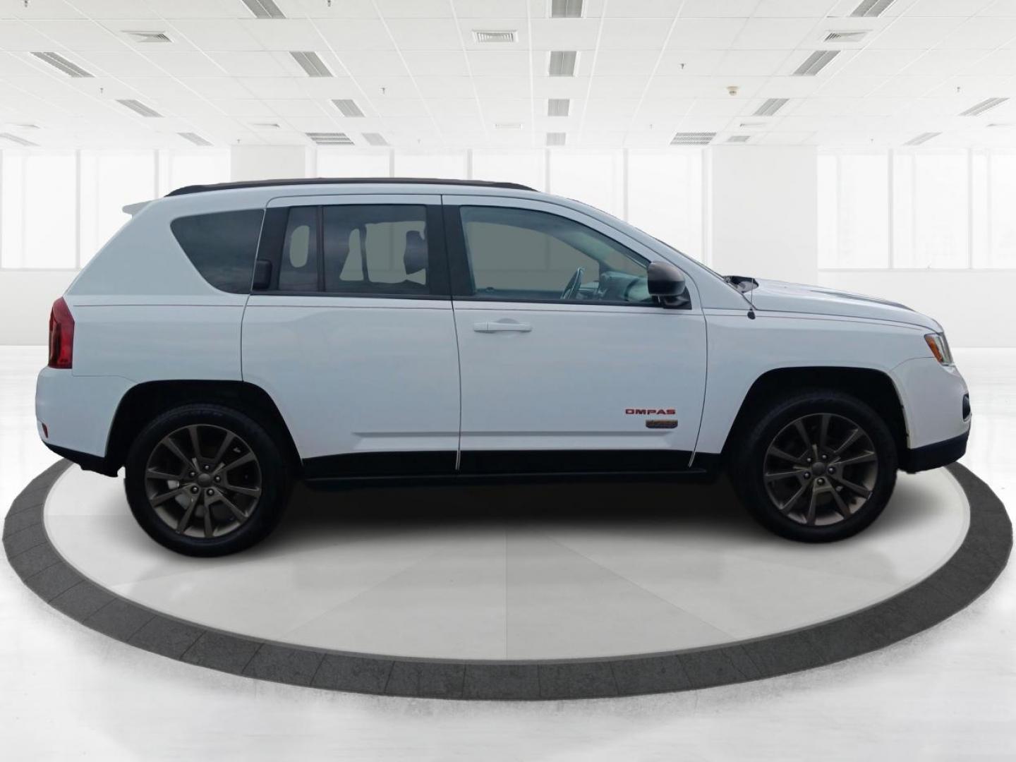 2017 White Knuckle Clear Coat Jeep Compass (1C4NJCBB4HD) with an 2.4L L4 DOHC 16V engine, located at 1951 S Dayton Lakeview Rd., New Carlisle, OH, 45344, (937) 908-9800, 39.890999, -84.050255 - Photo#1