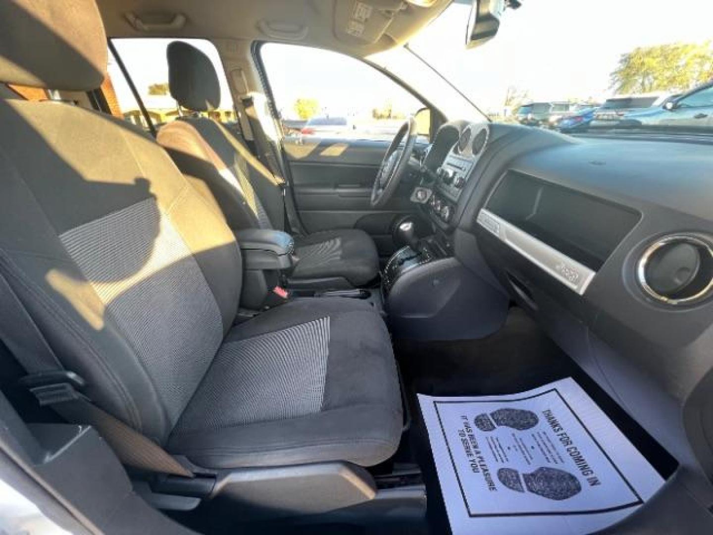 2017 White Knuckle Clear Coat Jeep Compass Sport FWD (1C4NJCBA3HD) with an 2.0L L4 DOHC 16V engine, located at 880 E. National Road, Vandalia, OH, 45377, (937) 908-9800, 39.892189, -84.181015 - Photo#9