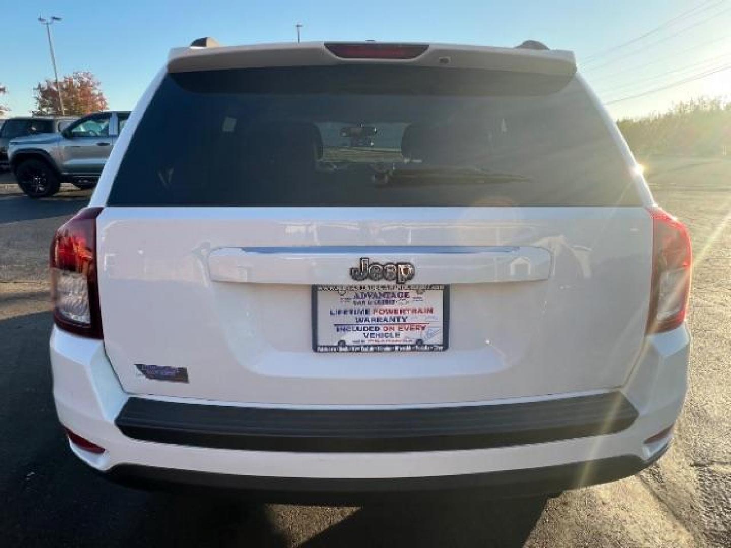 2017 White Knuckle Clear Coat Jeep Compass Sport FWD (1C4NJCBA3HD) with an 2.0L L4 DOHC 16V engine, located at 880 E. National Road, Vandalia, OH, 45377, (937) 908-9800, 39.892189, -84.181015 - Photo#4