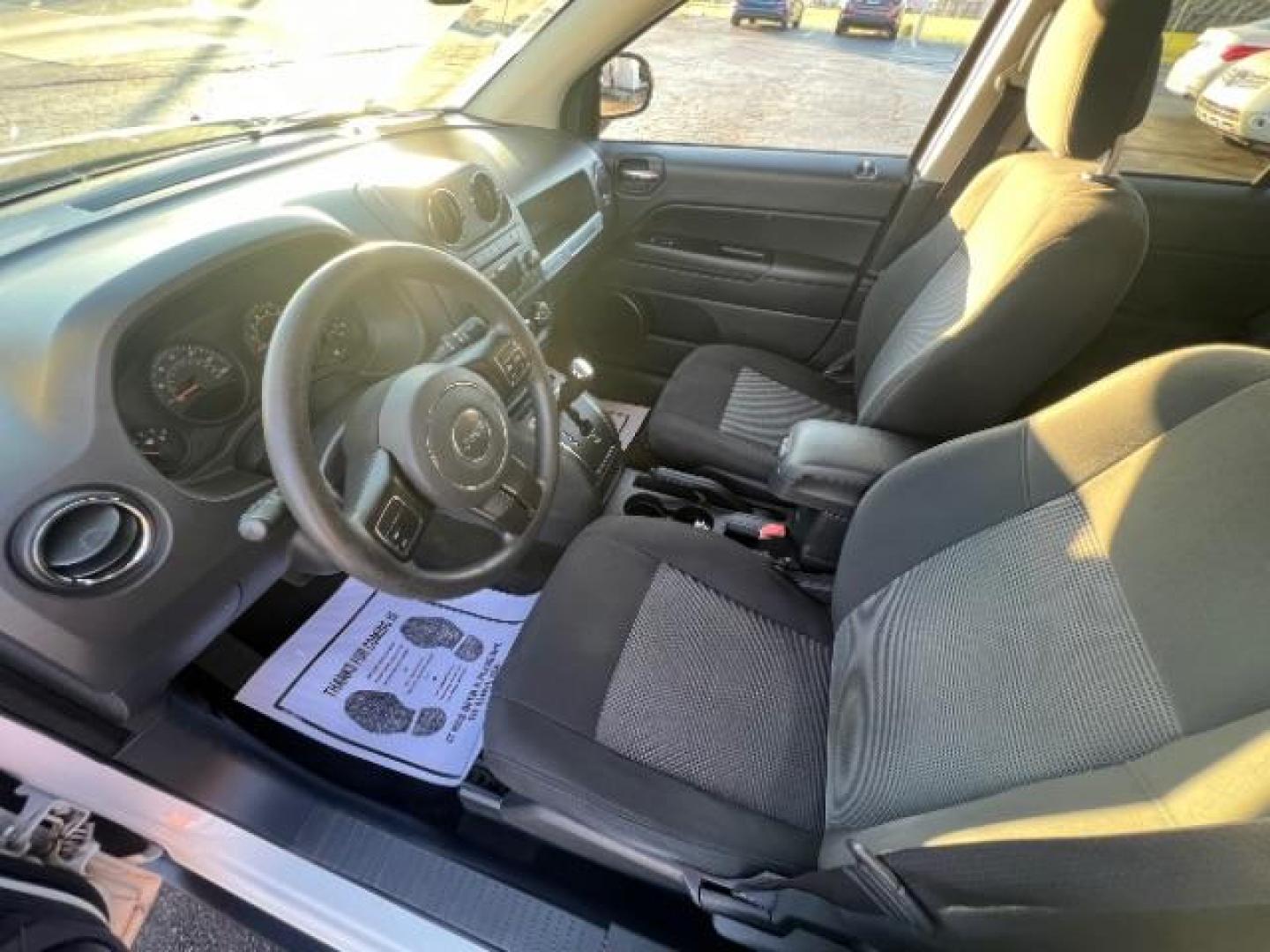 2017 White Knuckle Clear Coat Jeep Compass Sport FWD (1C4NJCBA3HD) with an 2.0L L4 DOHC 16V engine, located at 880 E. National Road, Vandalia, OH, 45377, (937) 908-9800, 39.892189, -84.181015 - Photo#6