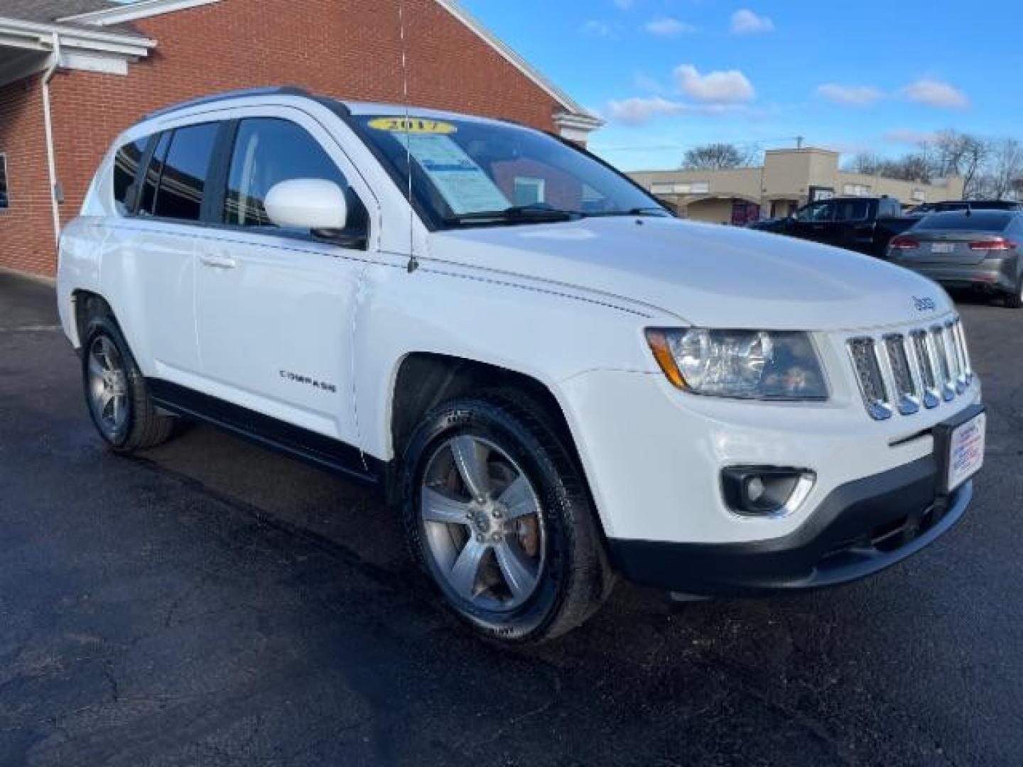 2017 White Knuckle Clear Coat Jeep Compass Latitude 4WD (1C4NJDEB8HD) with an 2.4L L4 DOHC 16V engine, 6-Speed Automatic transmission, located at 1951 S Dayton Lakeview Rd., New Carlisle, OH, 45344, (937) 908-9800, 39.890999, -84.050255 - Photo#0