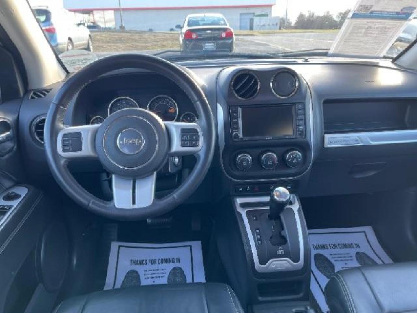 2017 White Knuckle Clear Coat Jeep Compass Latitude 4WD (1C4NJDEB8HD) with an 2.4L L4 DOHC 16V engine, 6-Speed Automatic transmission, located at 1951 S Dayton Lakeview Rd., New Carlisle, OH, 45344, (937) 908-9800, 39.890999, -84.050255 - Photo#6