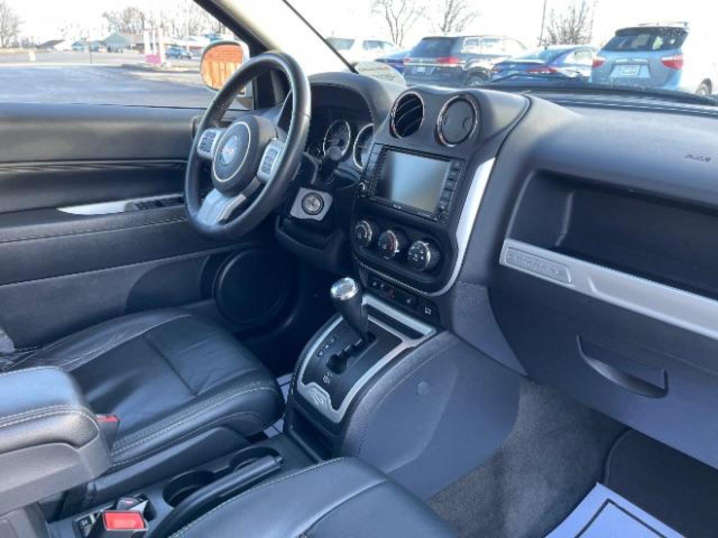 2017 White Knuckle Clear Coat Jeep Compass Latitude 4WD (1C4NJDEB8HD) with an 2.4L L4 DOHC 16V engine, 6-Speed Automatic transmission, located at 1951 S Dayton Lakeview Rd., New Carlisle, OH, 45344, (937) 908-9800, 39.890999, -84.050255 - Photo#7