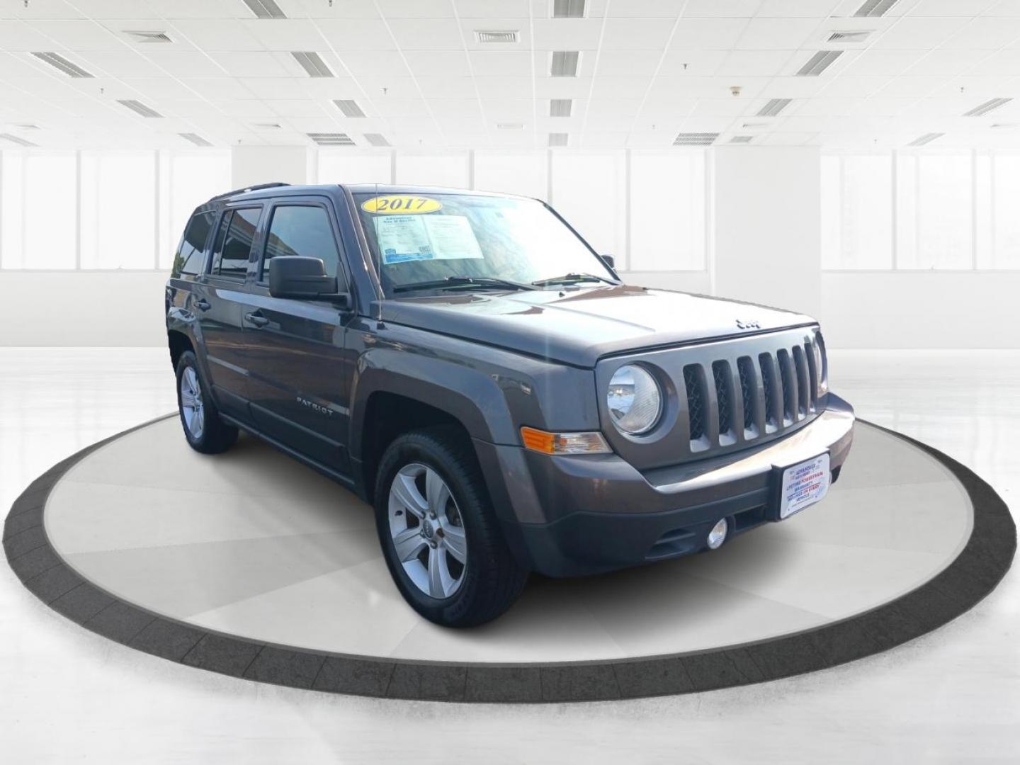 2017 Granite Metallic Clear Coat Jeep Patriot Latitude 4WD (1C4NJRFB1HD) with an 2.4L L4 DOHC 16V engine, located at 1230 East Main St, Xenia, OH, 45385, (937) 908-9800, 39.687321, -83.910294 - Photo#0