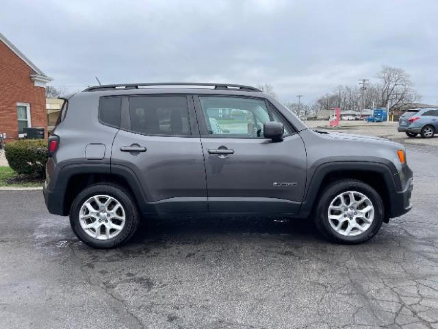 2017 Granite Crystal Metallic Clear Coat Jeep Renegade Latitude 4WD (ZACCJBBB6HP) with an 2.4L L4 DOHC 16V engine, 6-Speed Manual transmission, located at 1099 N County Rd 25A, OH, 45373, (937) 908-9800, 40.057079, -84.212883 - Photo#4