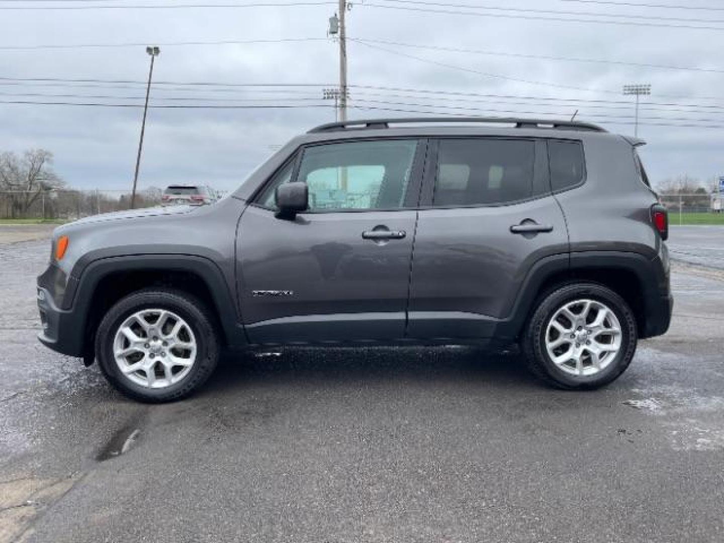 2017 Granite Crystal Metallic Clear Coat Jeep Renegade Latitude 4WD (ZACCJBBB6HP) with an 2.4L L4 DOHC 16V engine, 6-Speed Manual transmission, located at 1099 N County Rd 25A, OH, 45373, (937) 908-9800, 40.057079, -84.212883 - Photo#5