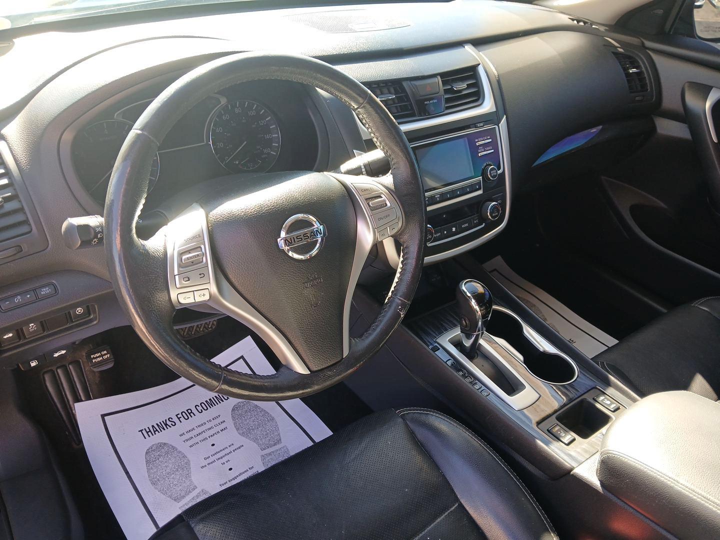 2017 Super Black Nissan Altima 2.5 S (1N4AL3AP6HC) with an 2.5L L4 DOHC 16V engine, CVT transmission, located at 880 E. National Road, Vandalia, OH, 45377, (937) 908-9800, 39.892189, -84.181015 - Photo#8