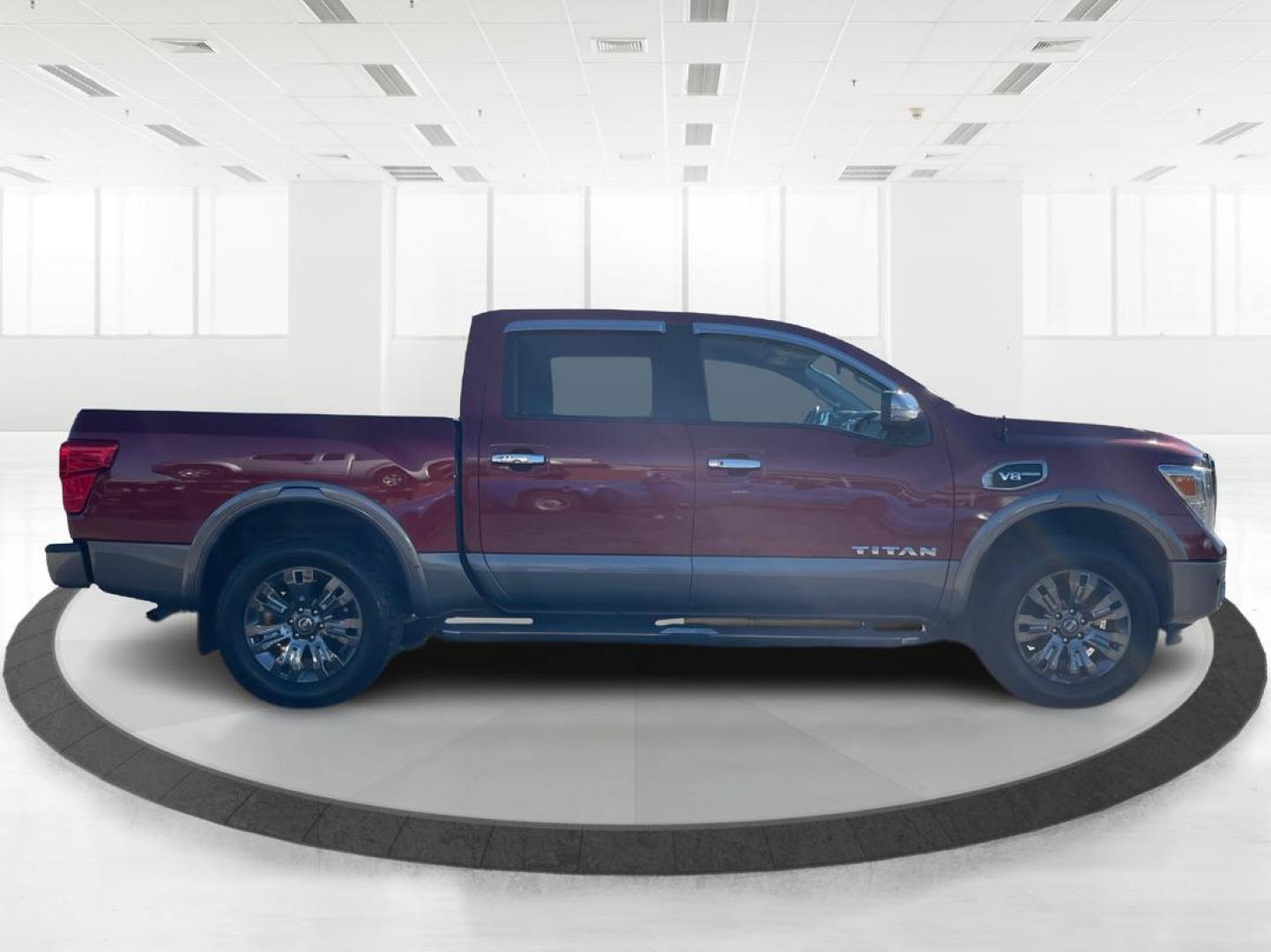 2017 Nissan Titan Platinum Reserve Crew Cab 4WD (1N6AA1E53HN) with an 5.6L V8 DOHC 32V engine, 6-Speed Automatic transmission, located at 1230 East Main St, Xenia, OH, 45385, (937) 908-9800, 39.688026, -83.910172 - 2017 Nissan Titan Platinum Reserve Crew Cab 4WD - Photo#1