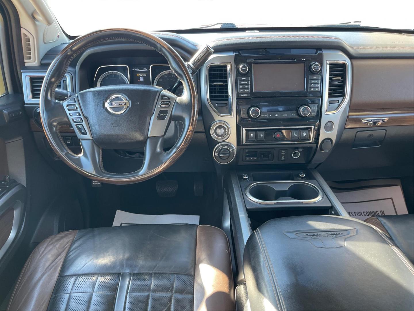 2017 Nissan Titan Platinum Reserve Crew Cab 4WD (1N6AA1E53HN) with an 5.6L V8 DOHC 32V engine, 6-Speed Automatic transmission, located at 1230 East Main St, Xenia, OH, 45385, (937) 908-9800, 39.688026, -83.910172 - 2017 Nissan Titan Platinum Reserve Crew Cab 4WD - Photo#20