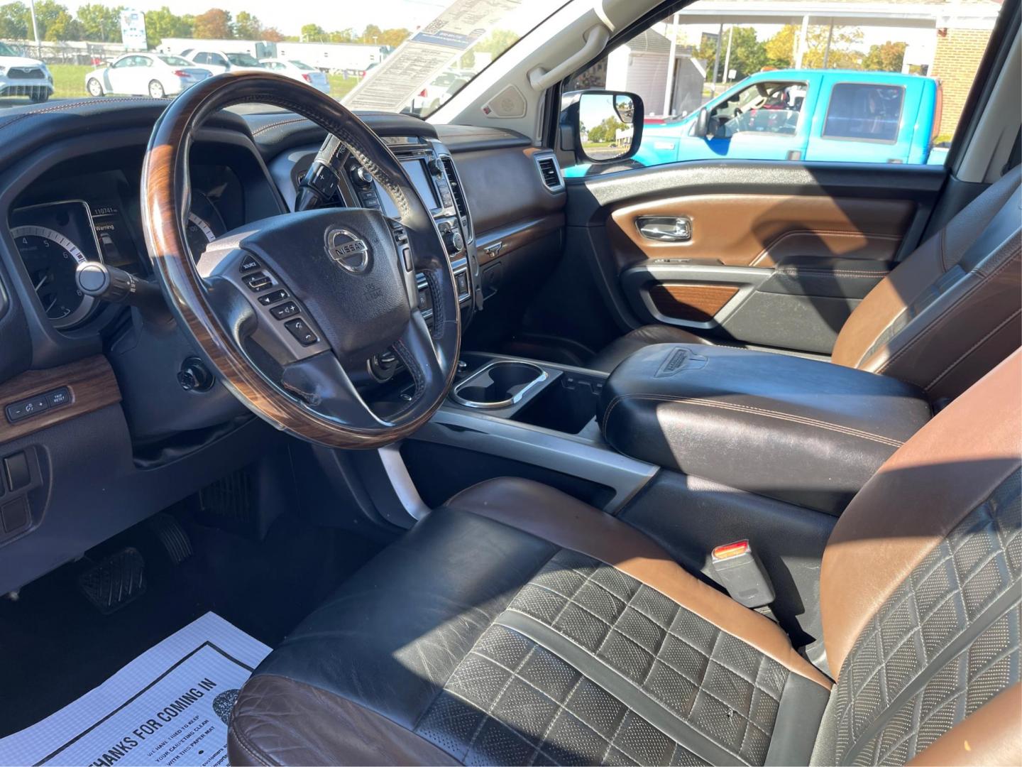 2017 Nissan Titan Platinum Reserve Crew Cab 4WD (1N6AA1E53HN) with an 5.6L V8 DOHC 32V engine, 6-Speed Automatic transmission, located at 1230 East Main St, Xenia, OH, 45385, (937) 908-9800, 39.688026, -83.910172 - 2017 Nissan Titan Platinum Reserve Crew Cab 4WD - Photo#8