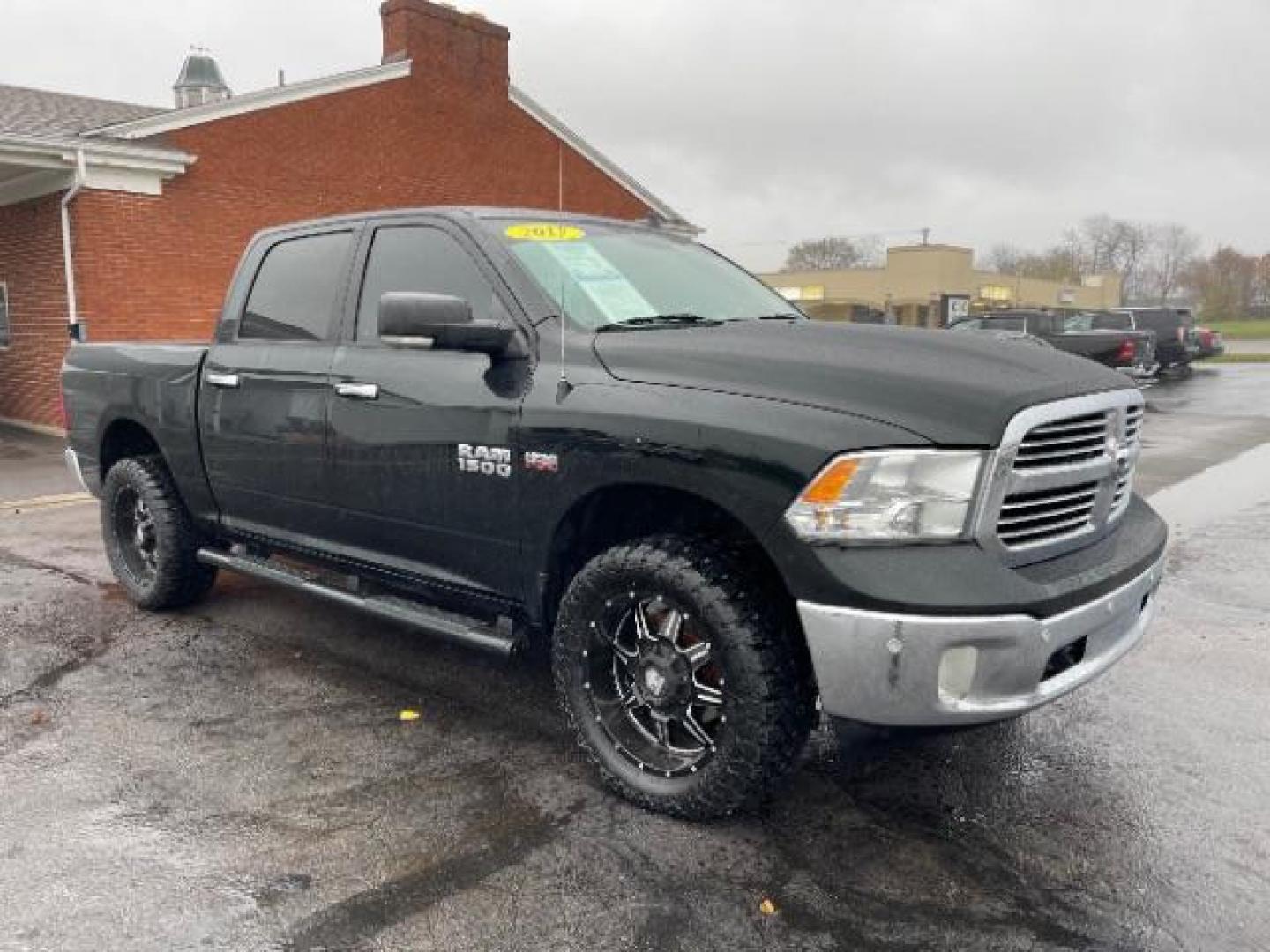 2017 Pitch Black Clear Coat RAM 1500 SLT Crew Cab SWB 4WD (3C6RR7LT7HG) with an 5.7L V8 OHV 16V engine, 8-Speed Automatic transmission, located at 880 E. National Road, Vandalia, OH, 45377, (937) 908-9800, 39.892189, -84.181015 - Photo#0