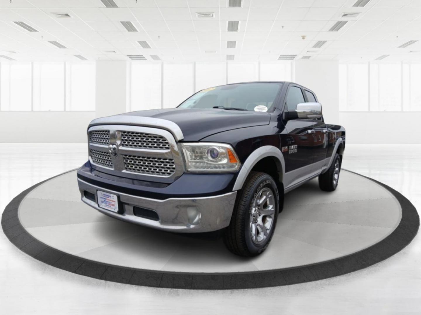 2017 RAM 1500 Laramie Quad Cab 4WD (1C6RR7JT1HS) with an 5.7L V8 OHV 16V engine, 8-Speed Automatic transmission, located at 1099 N County Rd 25A, Troy, OH, 45373, (937) 908-9800, 40.057079, -84.212883 - 2017 RAM 1500 Laramie Quad Cab 4WD - Photo#7