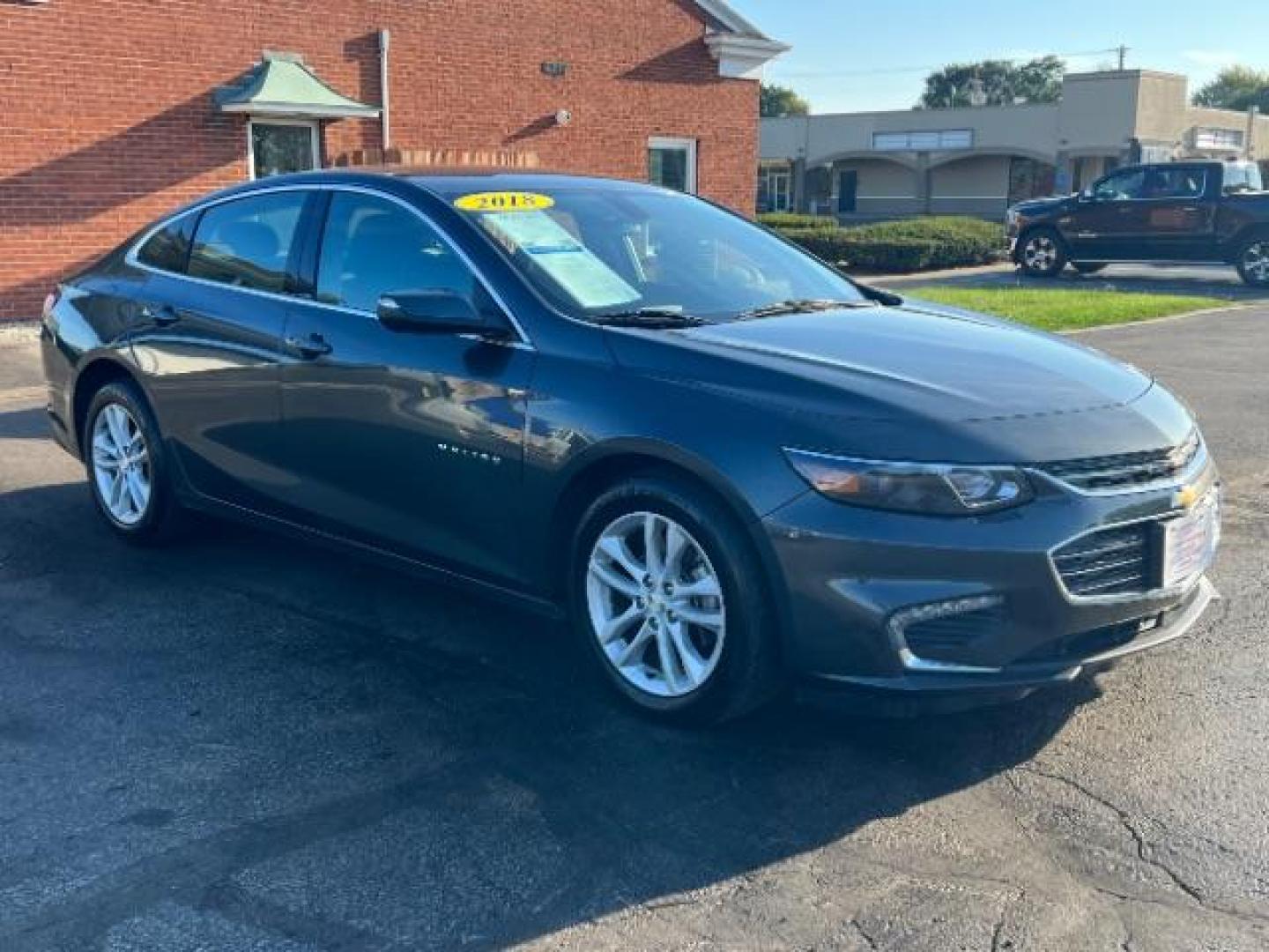 2018 Nightfall Gray Metallic Chevrolet Malibu LT (1G1ZD5ST9JF) with an 1.5L L4 DOHC 16V engine, 6-Speed Automatic transmission, located at 1230 East Main St, Xenia, OH, 45385, (937) 908-9800, 39.687321, -83.910294 - Photo#0