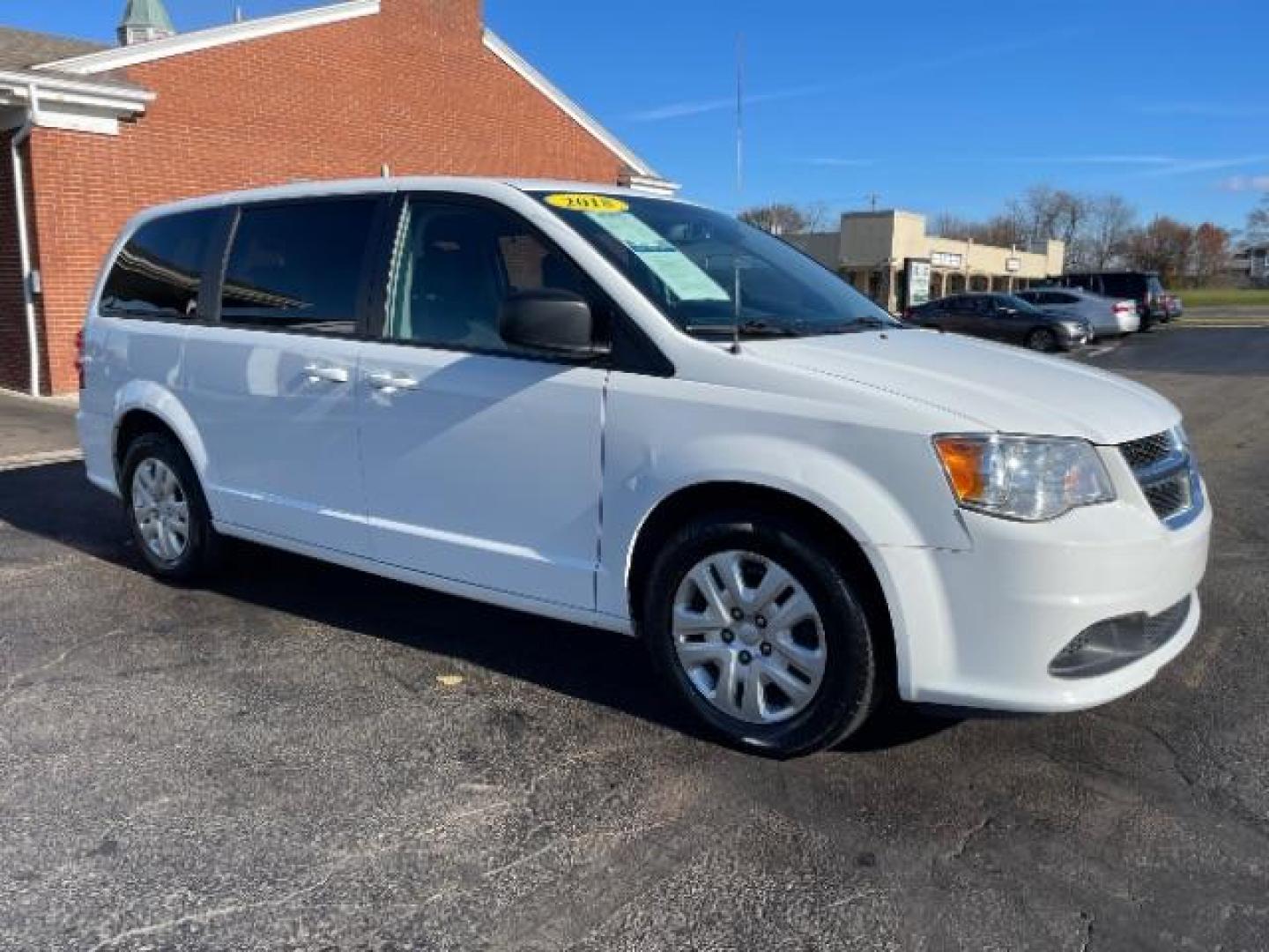 2018 White Knuckle Clear Coat Dodge Grand Caravan SE (2C4RDGBG0JR) with an 3.6L V6 DOHC 24V engine, 6-Speed Automatic transmission, located at 4508 South Dixie Dr, Moraine, OH, 45439, (937) 908-9800, 39.690136, -84.216438 - Photo#0