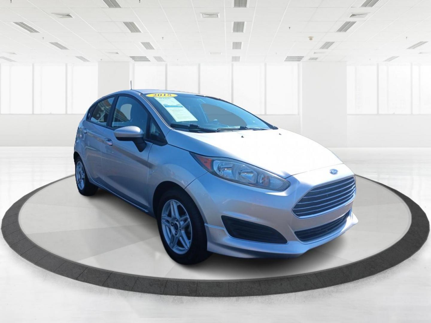 2018 Ingot Silver Metallic Ford Fiesta SE Hatchback (3FADP4EJ5JM) with an 1.6L L4 DOHC 16V engine, located at 1230 East Main St, Xenia, OH, 45385, (937) 908-9800, 39.687321, -83.910294 - Photo#0