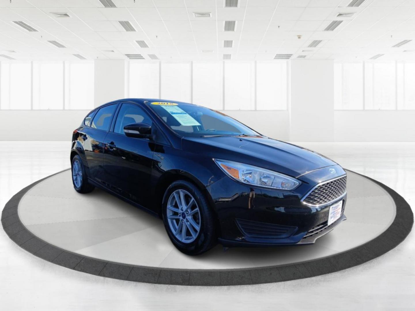 2018 Shadow Black Ford Focus SE Hatch (1FADP3K20JL) with an 2.0L L4 DOHC 16V engine, located at 1099 N County Rd 25A, OH, 45373, (937) 908-9800, 40.057079, -84.212883 - Photo#0