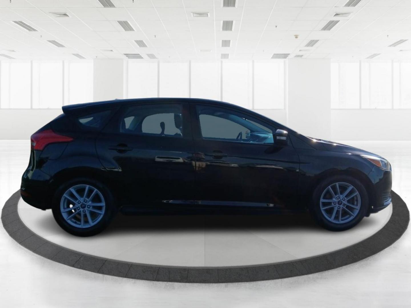 2018 Shadow Black Ford Focus SE Hatch (1FADP3K20JL) with an 2.0L L4 DOHC 16V engine, located at 1099 N County Rd 25A, OH, 45373, (937) 908-9800, 40.057079, -84.212883 - Photo#1