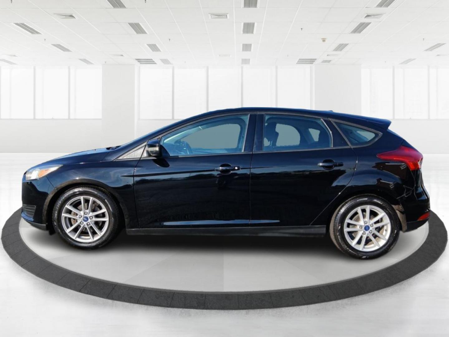 2018 Shadow Black Ford Focus SE Hatch (1FADP3K20JL) with an 2.0L L4 DOHC 16V engine, located at 1099 N County Rd 25A, OH, 45373, (937) 908-9800, 40.057079, -84.212883 - Photo#5