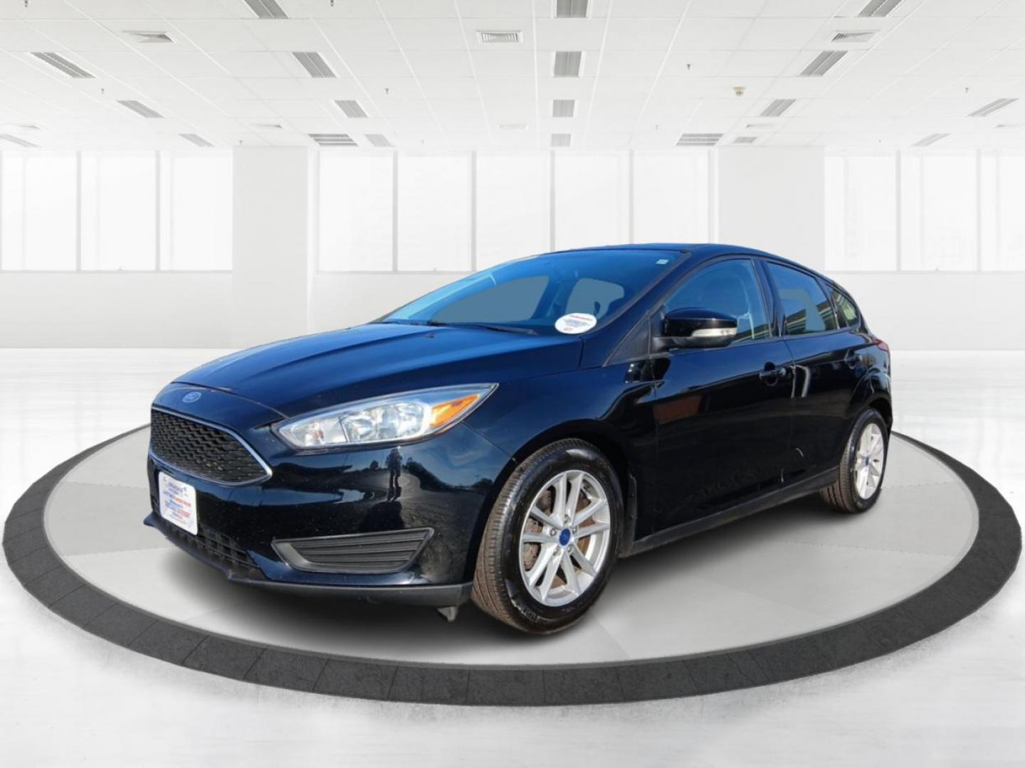 2018 Shadow Black Ford Focus SE Hatch (1FADP3K20JL) with an 2.0L L4 DOHC 16V engine, located at 1099 N County Rd 25A, OH, 45373, (937) 908-9800, 40.057079, -84.212883 - Photo#7