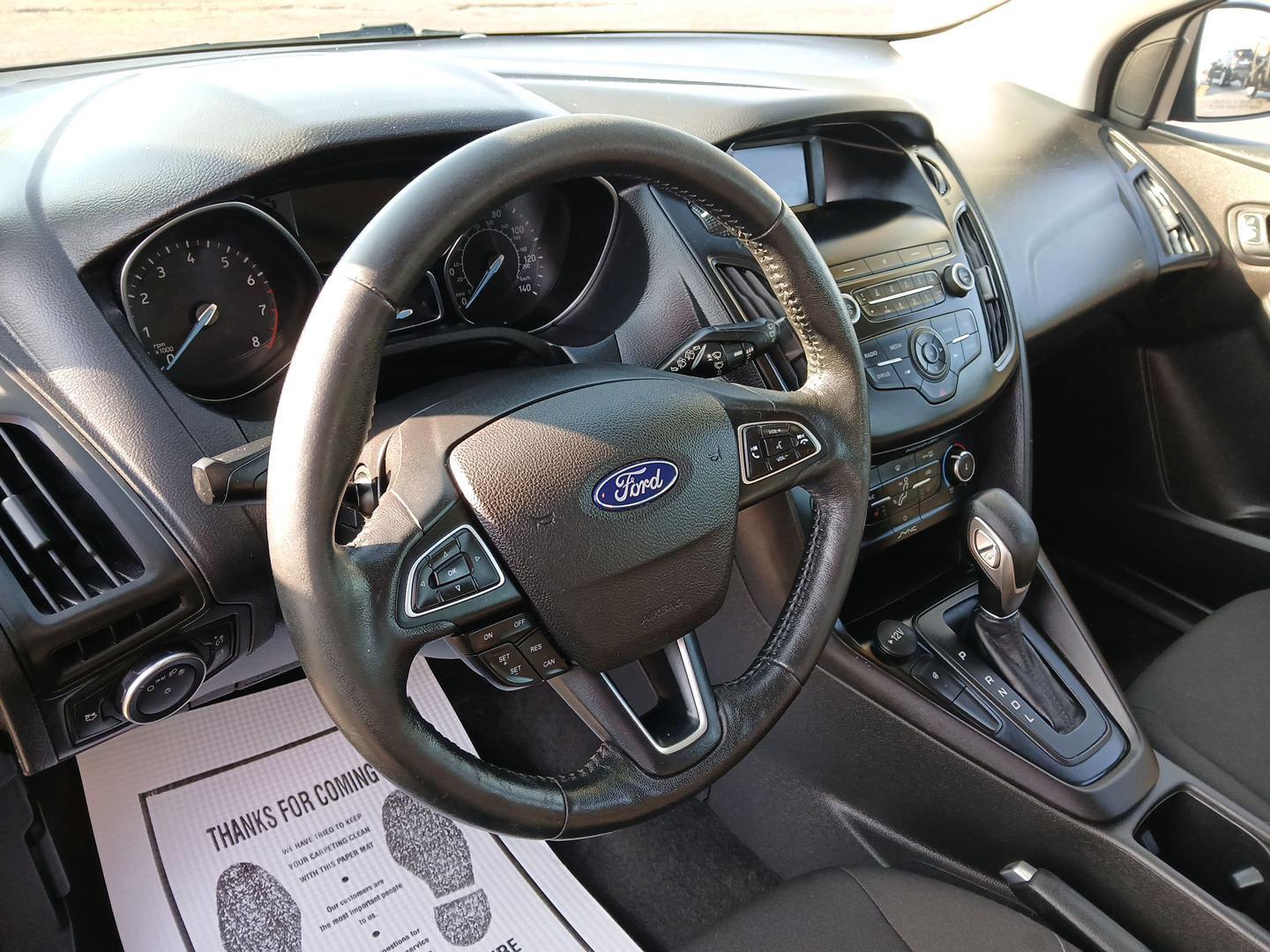 2018 Shadow Black Ford Focus SE Hatch (1FADP3K20JL) with an 2.0L L4 DOHC 16V engine, located at 1099 N County Rd 25A, OH, 45373, (937) 908-9800, 40.057079, -84.212883 - Photo#8