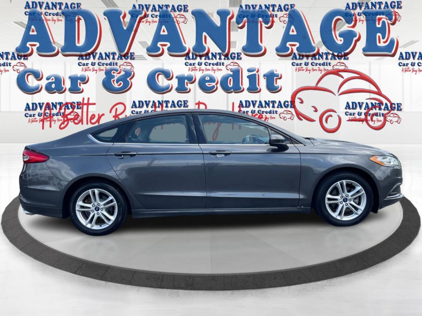 2018 Magnetic Metallic Ford Fusion SE (3FA6P0HD2JR) with an 1.5L L4 DOHC 16V engine, 6A transmission, located at 1951 S Dayton Lakeview Rd., New Carlisle, OH, 45344, (937) 908-9800, 39.890999, -84.050255 - Photo#1