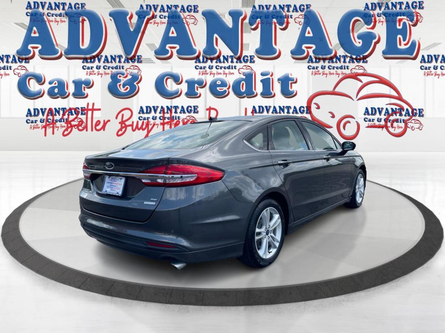 2018 Magnetic Metallic Ford Fusion SE (3FA6P0HD2JR) with an 1.5L L4 DOHC 16V engine, 6A transmission, located at 1951 S Dayton Lakeview Rd., New Carlisle, OH, 45344, (937) 908-9800, 39.890999, -84.050255 - Photo#2