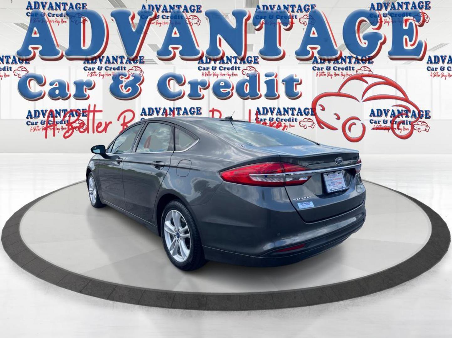 2018 Magnetic Metallic Ford Fusion SE (3FA6P0HD2JR) with an 1.5L L4 DOHC 16V engine, 6A transmission, located at 1951 S Dayton Lakeview Rd., New Carlisle, OH, 45344, (937) 908-9800, 39.890999, -84.050255 - Photo#4