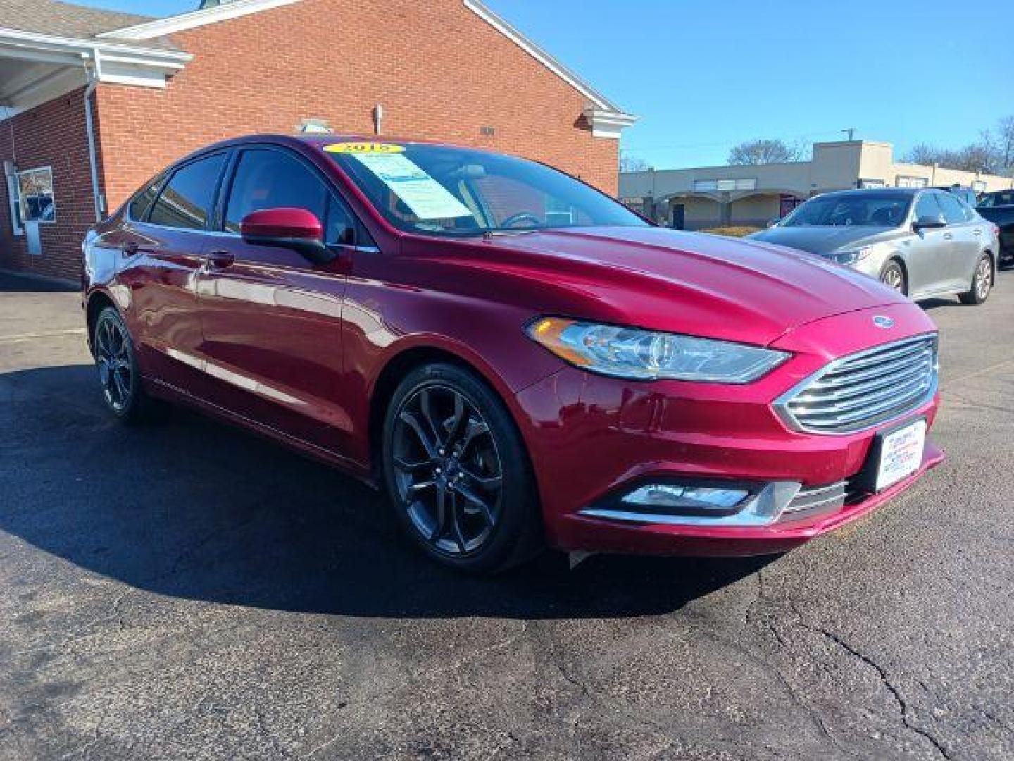 2018 Burgundy Velvet Metallic Tinted Clearcoat Ford Fusion SE (3FA6P0HDXJR) with an 1.5L L4 DOHC 16V engine, 6-Speed Automatic transmission, located at 1230 East Main St, Xenia, OH, 45385, (937) 908-9800, 39.687321, -83.910294 - Photo#0