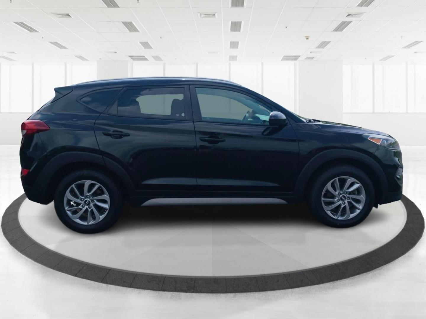 2018 Black Noir Pearl Hyundai Tucson SEL AWD (KM8J3CA40JU) with an 2.0L L4 DOHC 16V engine, 6-Speed Automatic transmission, located at 1951 S Dayton Lakeview Rd., New Carlisle, OH, 45344, (937) 908-9800, 39.890999, -84.050255 - Photo#1