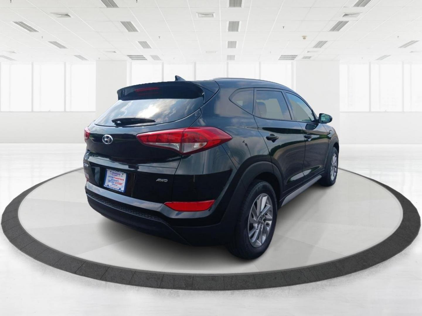 2018 Black Noir Pearl Hyundai Tucson SEL AWD (KM8J3CA40JU) with an 2.0L L4 DOHC 16V engine, 6-Speed Automatic transmission, located at 1951 S Dayton Lakeview Rd., New Carlisle, OH, 45344, (937) 908-9800, 39.890999, -84.050255 - Photo#2