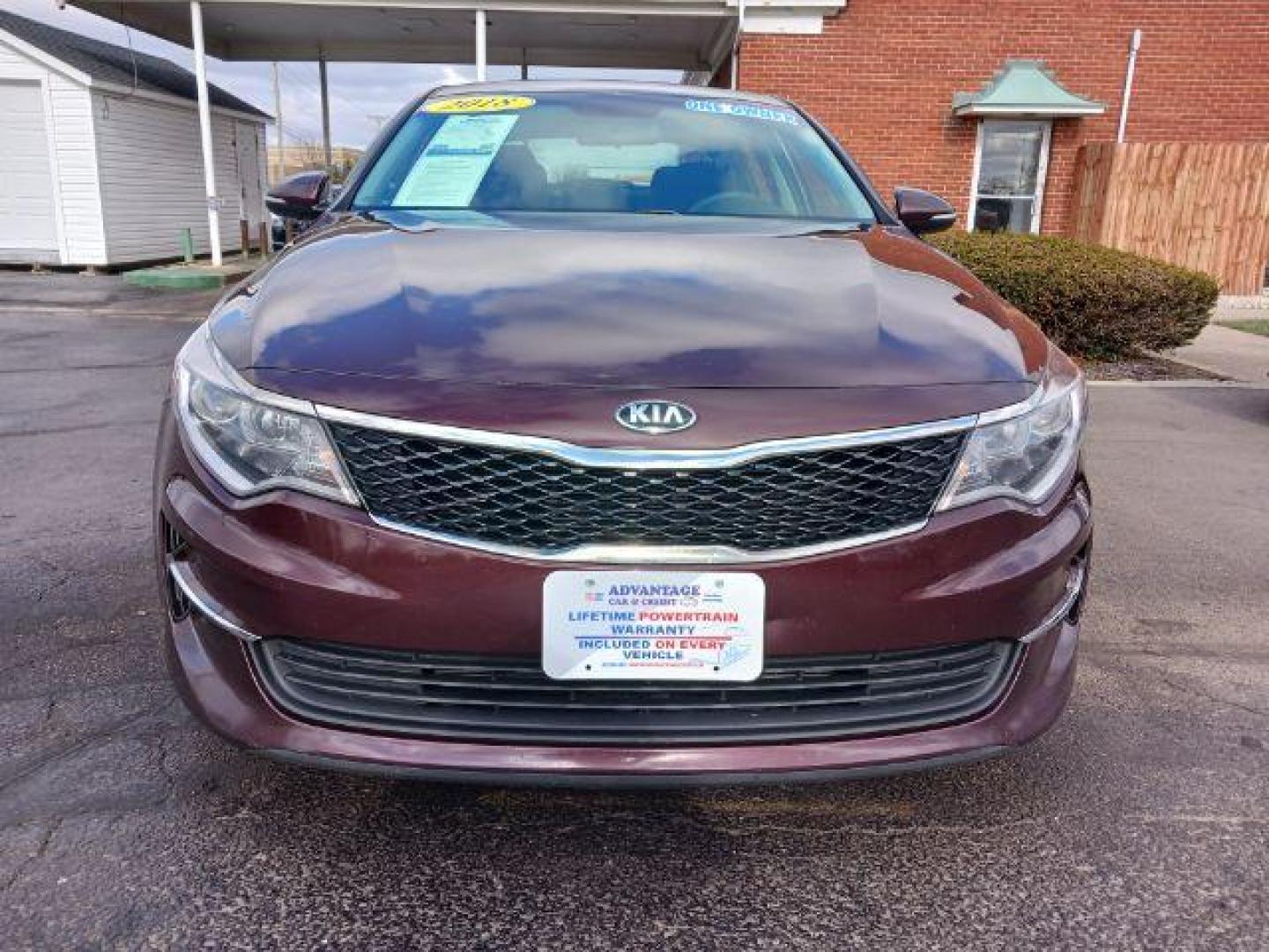 2018 Sangria Kia Optima LX (5XXGT4L34JG) with an 2.4L L4 DOHC 16V engine, 6-Speed Automatic transmission, located at 880 E. National Road, Vandalia, OH, 45377, (937) 908-9800, 39.892189, -84.181015 - Photo#1