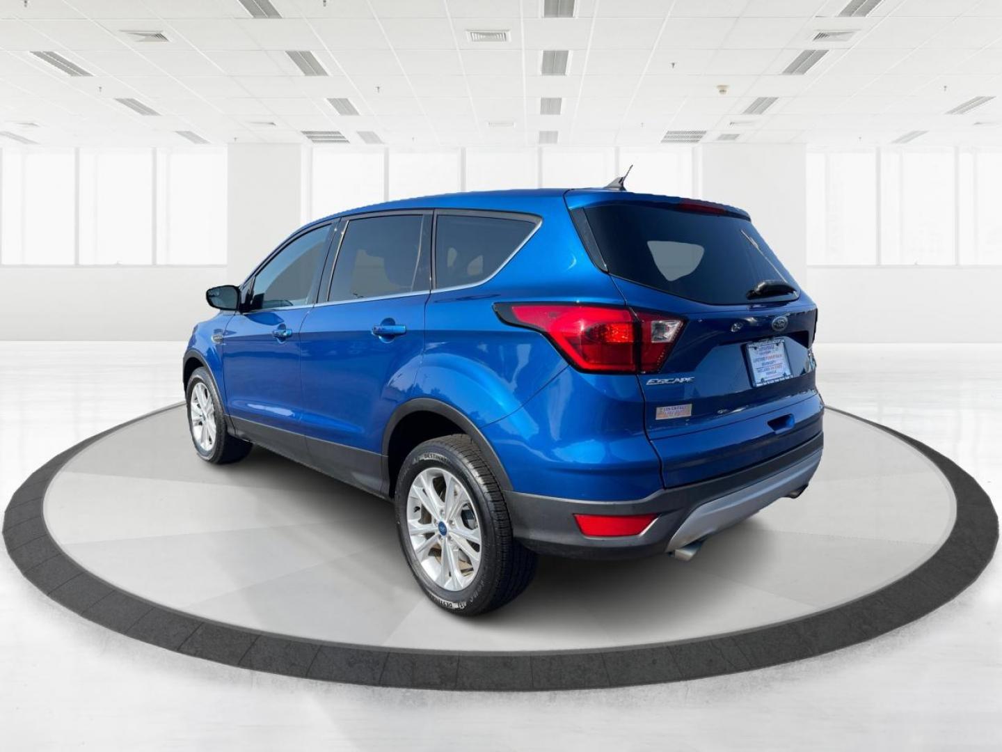 2019 Lightning Blue Metallic Ford Escape (1FMCU9GD8KU) with an 1.5L L4 DOHC 16V engine, 6-Speed Automatic transmission, located at 880 E. National Road, Vandalia, OH, 45377, (937) 908-9800, 39.892189, -84.181015 - Photo#4