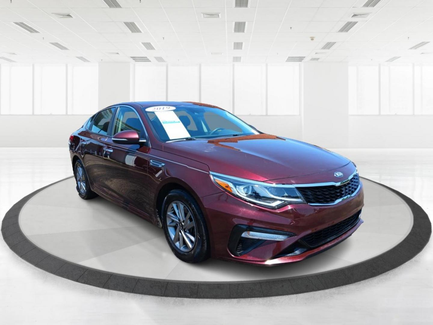 2019 Sangria Kia Optima (5XXGT4L30KG) with an 2.4L L4 DOHC 16V engine, 6-Speed Automatic transmission, located at 1099 N County Rd 25A, OH, 45373, (937) 908-9800, 40.057079, -84.212883 - Photo#0