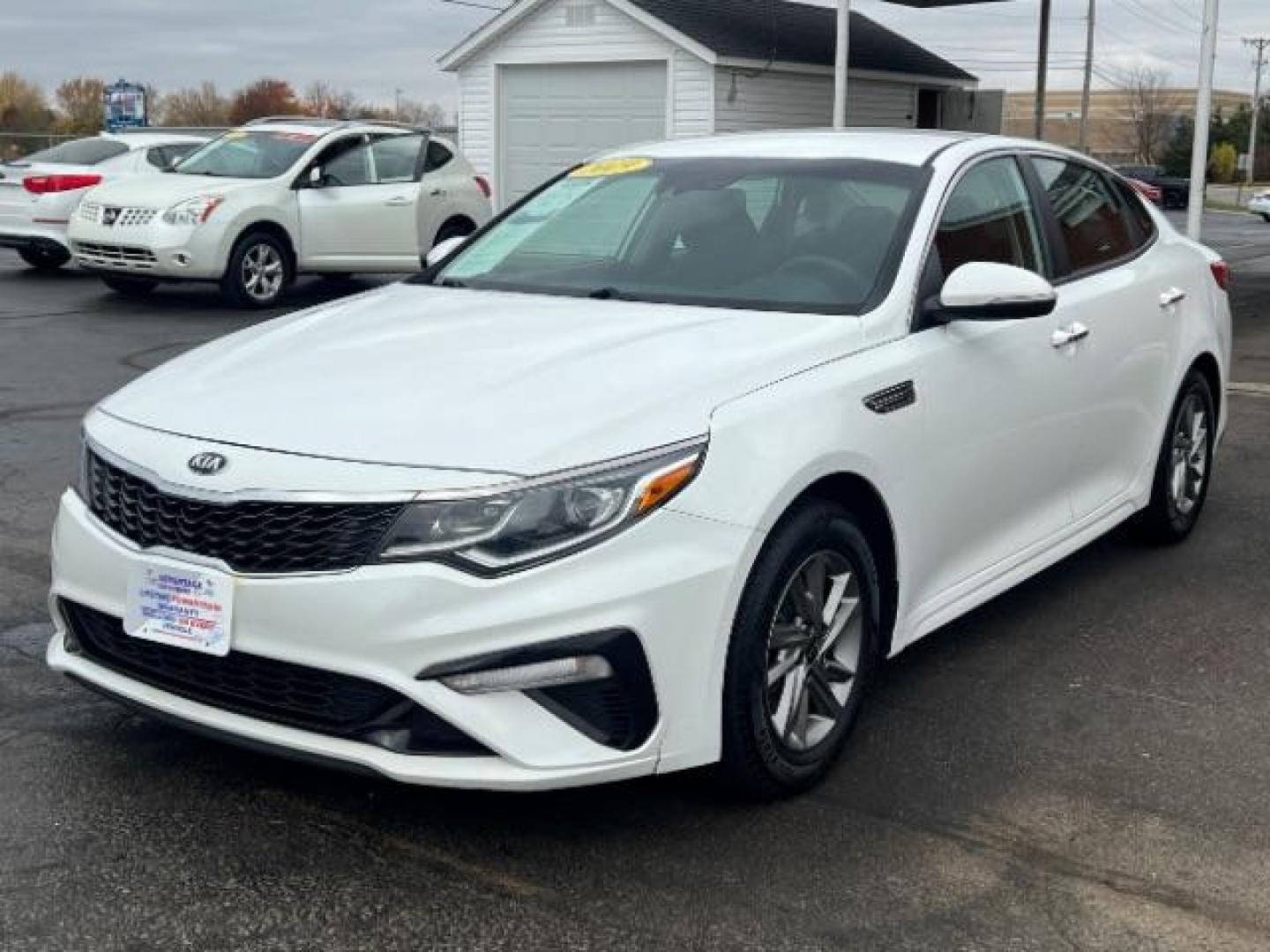 2019 Snow White Pearl Kia Optima LX (5XXGT4L30KG) with an 2.4L L4 DOHC 16V engine, 6-Speed Automatic transmission, located at 4508 South Dixie Dr, Moraine, OH, 45439, (937) 908-9800, 39.690136, -84.216438 - Photo#2