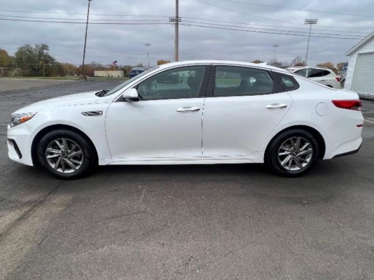 2019 Snow White Pearl Kia Optima LX (5XXGT4L30KG) with an 2.4L L4 DOHC 16V engine, 6-Speed Automatic transmission, located at 4508 South Dixie Dr, Moraine, OH, 45439, (937) 908-9800, 39.690136, -84.216438 - Photo#3